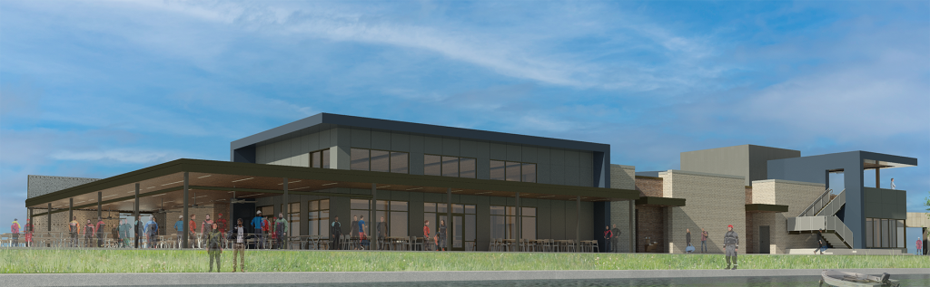 A modern, single-story building designed by a skilled structural engineer, featuring large glass windows, a covered patio, and people walking outside. The clean lines and mix of brick and metal showcase innovative civil engineering against a blue sky.